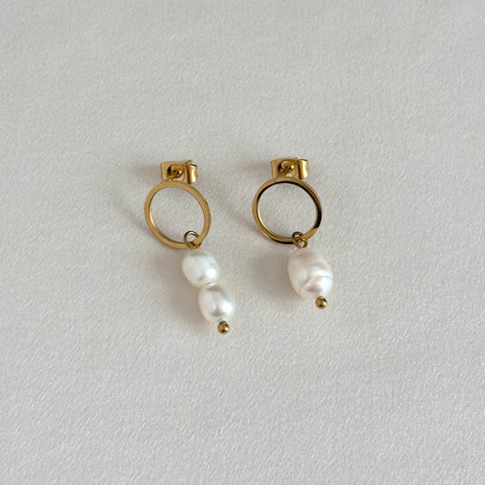 Modèle unique - Boucles d'oreilles cercle asymétriques