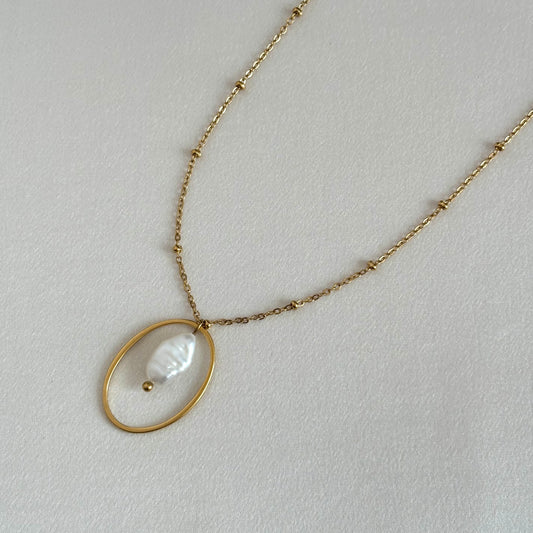 Modèle unique - Collier cercle et perle d'eau douce